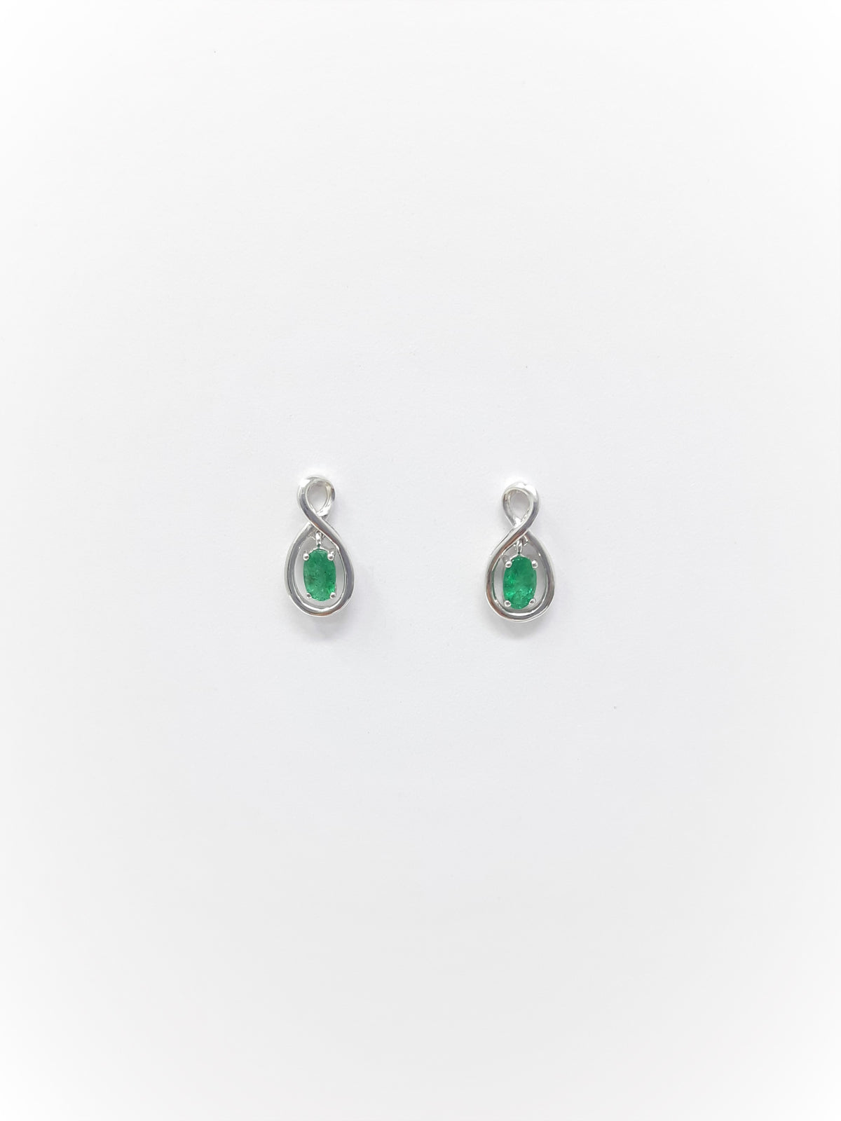 10K White Gold Oval Cut Emerald Stud Earrings
