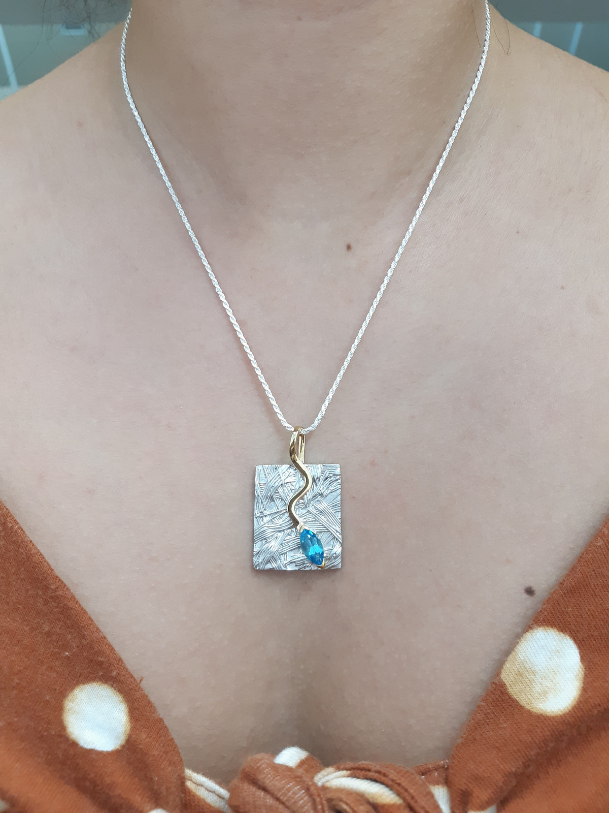 Silver and Blue Topaz Pendant