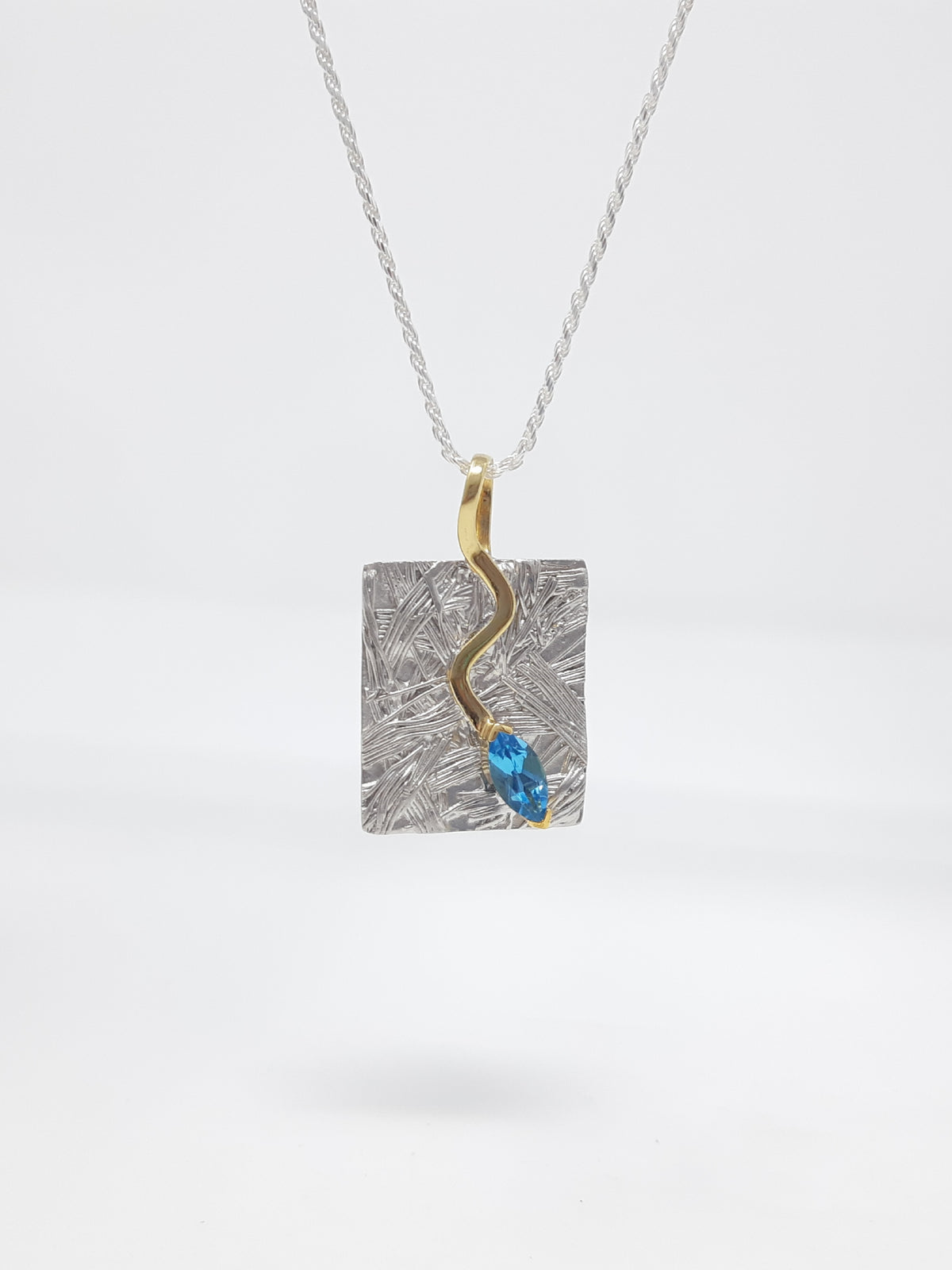 Silver and Blue Topaz Pendant