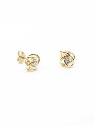 Aretes de diamantes canadienses de 0,10 quilates en oro amarillo de 10 quilates