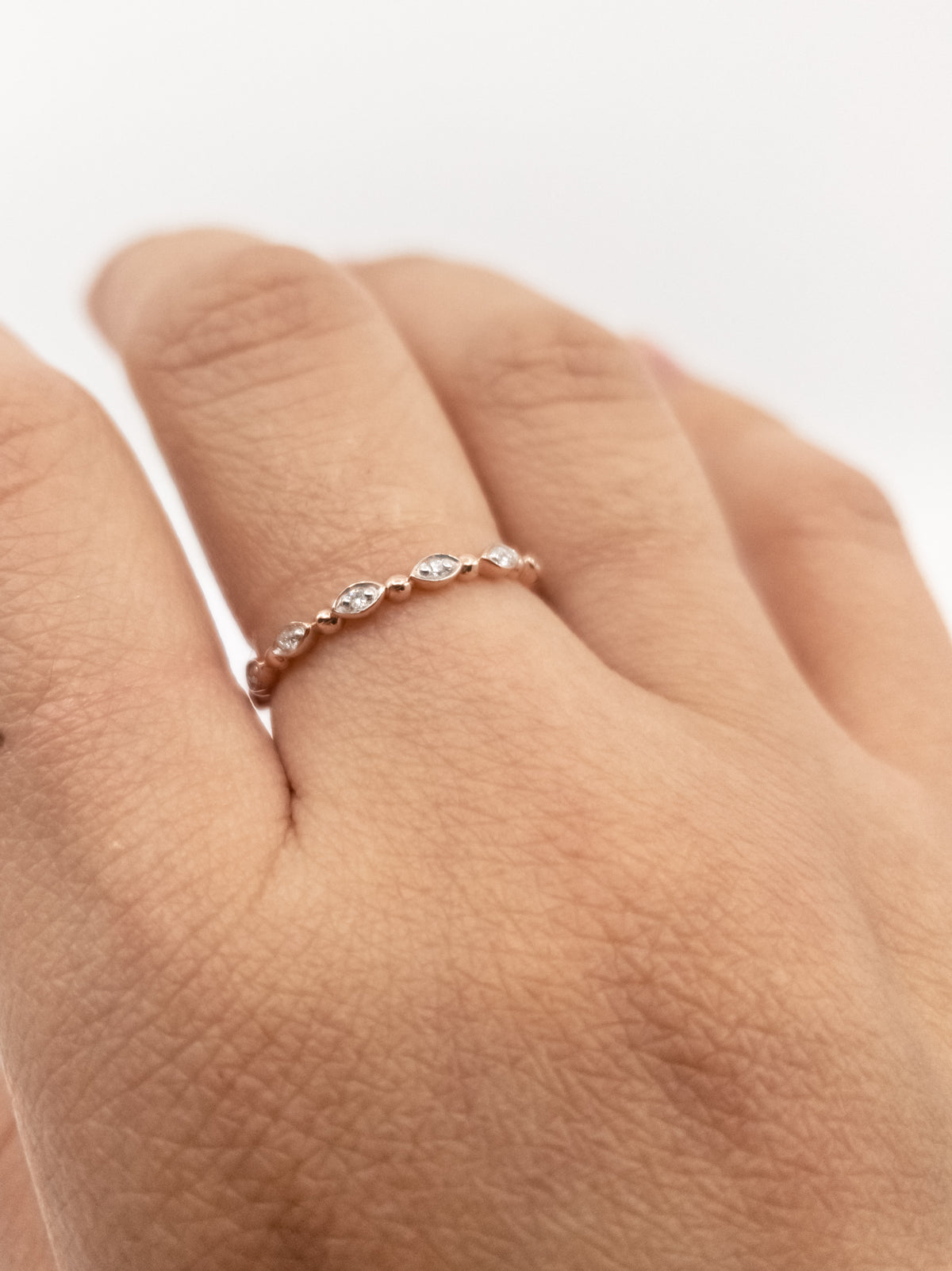 10K Rose Gold 0.06cttw Diamond Ring, size 7