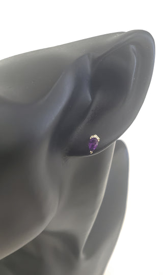 Aretes de diamantes y amatista en oro amarillo de 10 quilates