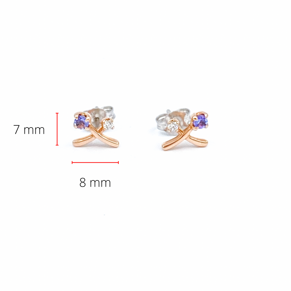 Pendientes de oro blanco y rosa de 14 quilates con tanzanita genuina de 0,16 quilates y diamantes canadienses de 0,05 quilates
