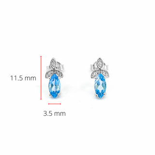 Pendientes de oro blanco de 10 quilates con topacio azul genuino de 0,75 quilates y diamantes de 0,03 quilates