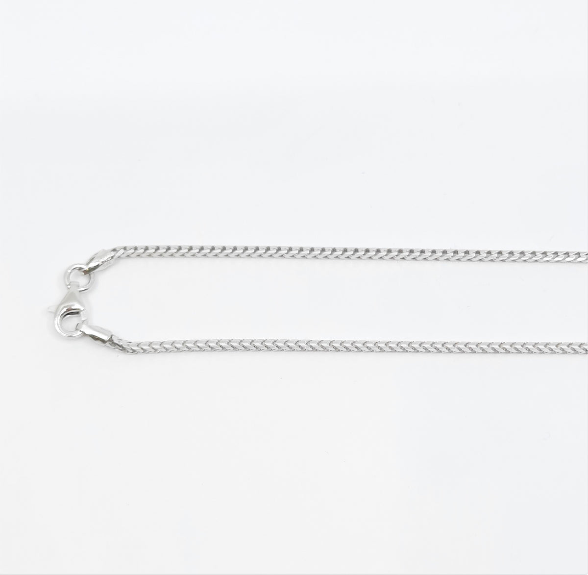 Cadena Franco chapada en rodio de 1,4 mm de plata de ley 925 con cierre de langosta - 20 pulgadas 