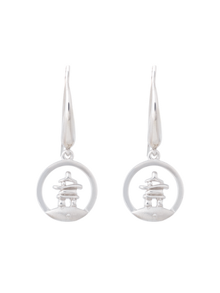 Silver earrings with circular designs on a white background