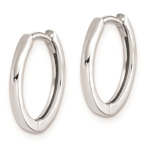 Pair of silver hoop earrings on a white background