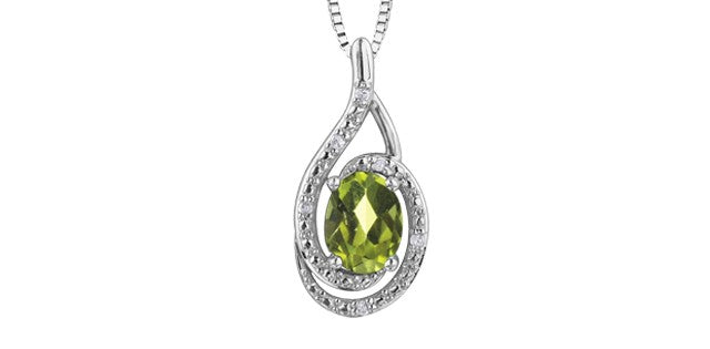Teardrop-shaped pendant with green gemstone and diamond accents on a white background