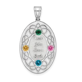 Silver pendant with engraved names and colored gemstones on a white background