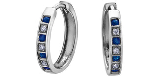 Aretes de diamantes y zafiros en oro blanco de 10 quilates