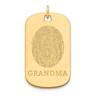 Gold pendant with fingerprint engraving and 'GRANDMA' text on a white background