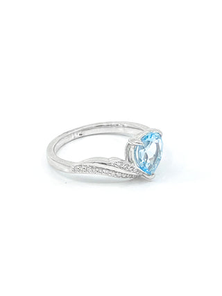 Anillo de oro blanco de 10 quilates con topacio azul genuino de 1,40 quilates y diamante de 0,16 quilates, talla 6,5