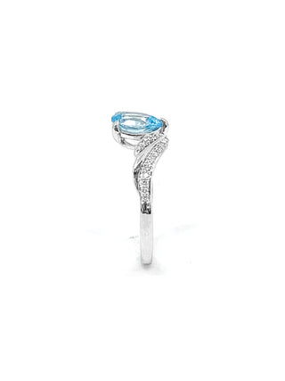 Anillo de oro blanco de 10 quilates con topacio azul genuino de 1,40 quilates y diamante de 0,16 quilates, talla 6,5