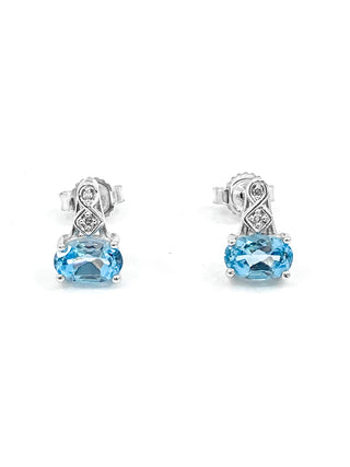 Pendientes de oro blanco de 10 quilates con topacio azul genuino de 1,20 quilates y diamantes de 0,02 quilates