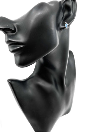 Pendientes de oro blanco de 10 quilates con topacio azul genuino de 0,75 quilates y diamantes de 0,03 quilates