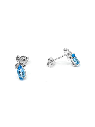 Pendientes de oro blanco de 10 quilates con topacio azul genuino de 0,75 quilates y diamantes de 0,03 quilates