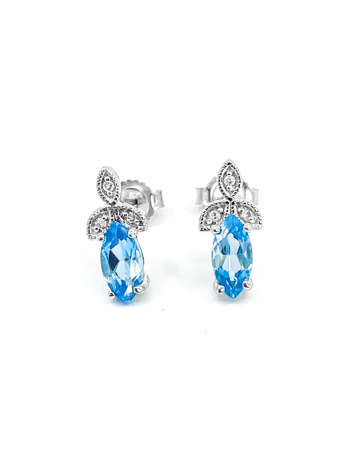 Pendientes de oro blanco de 10 quilates con topacio azul genuino de 0,75 quilates y diamantes de 0,03 quilates