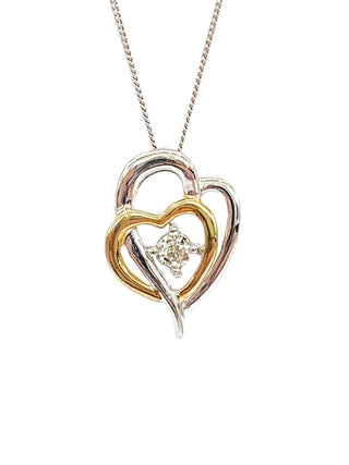 Colgante en forma de corazón con diamantes de 0,15 quilates en oro blanco y amarillo de 10 quilates, 18"