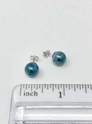 Aretes de perlas negras cultivadas