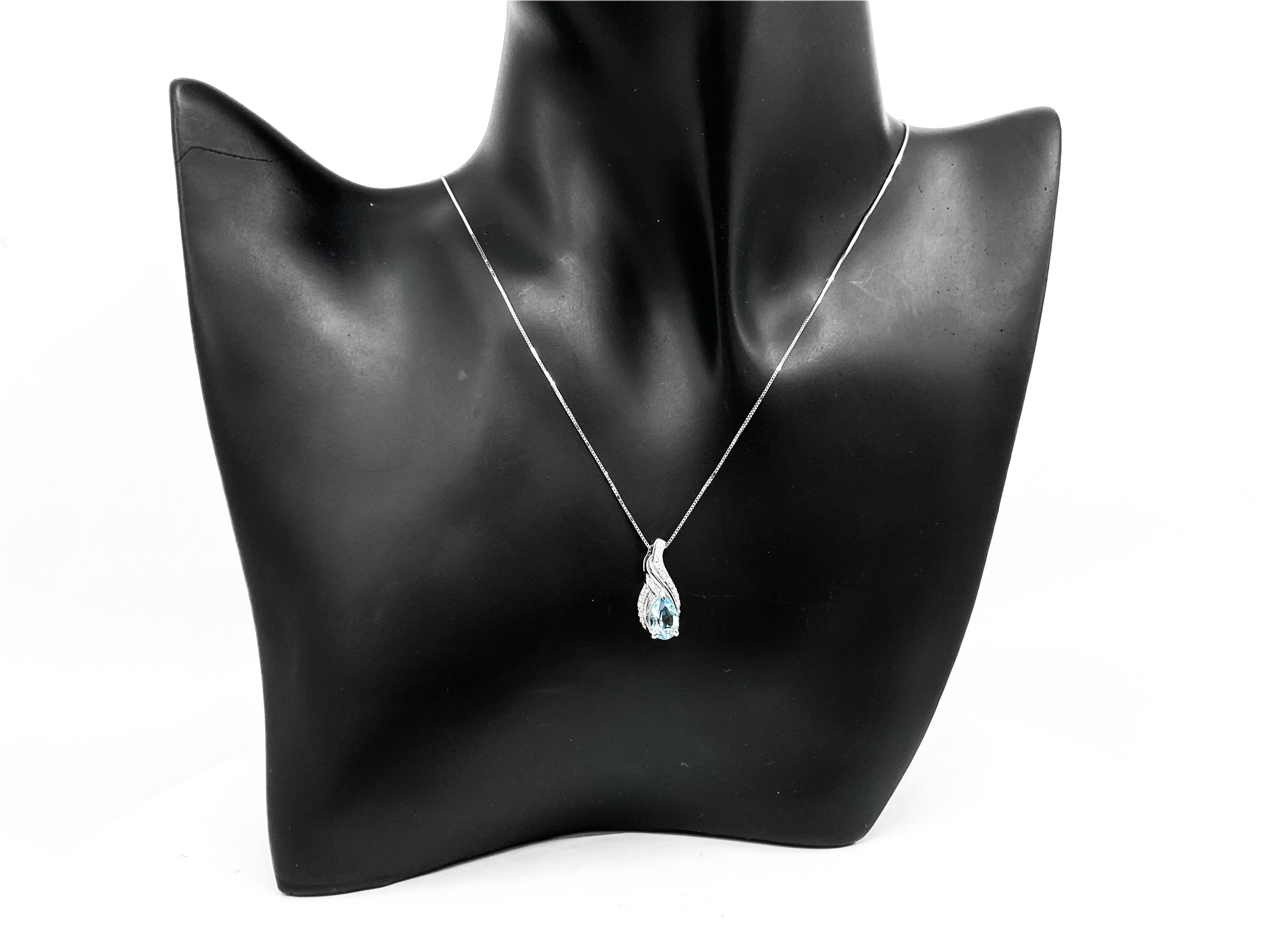 10K White Gold 1.40cttw Blue Topaz & 0.10cttw Diamond Pendant, 18"