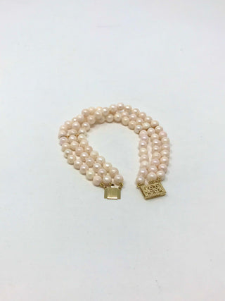 Pulsera de perlas de triple hebra