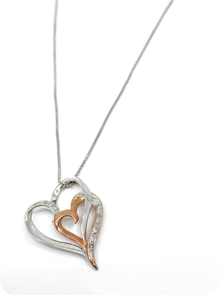 Colgante de doble corazón con diamantes de 0,035 quilates en oro blanco y rosa de 10 quilates, 18"