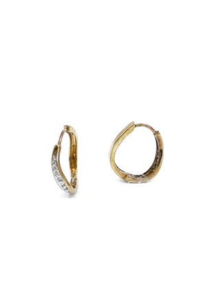 Pendientes tipo argolla con bisagras Huggie de oro amarillo de 10 quilates con diamantes de 0,12 quilates