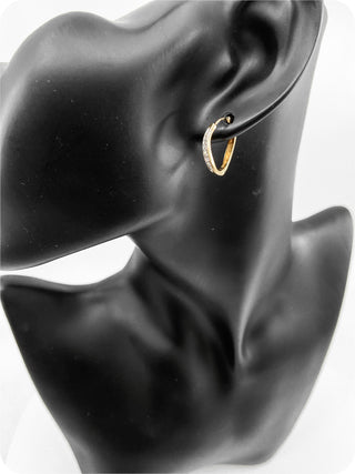 Pendientes tipo argolla con bisagras Huggie de oro amarillo de 10 quilates con diamantes de 0,12 quilates