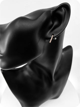 Aretes de línea de diamantes de 0,11 quilates en oro rosa de 10 quilates