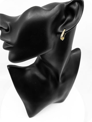 Aretes tipo argolla con diamantes de 0,25 quilates en oro amarillo de 10 quilates