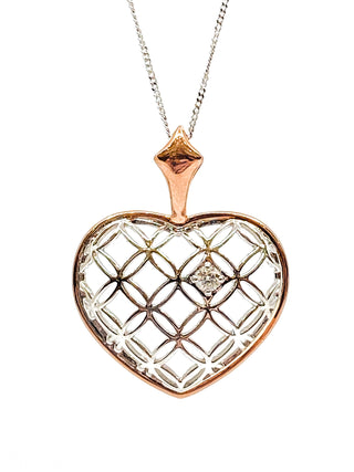 Collar con forma de corazón de diamantes canadienses de 0,142 quilates en oro blanco y rosa de 10 quilates, 18"