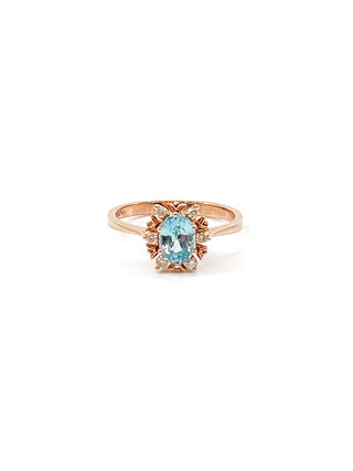 Anillo de oro rosa de 10 quilates con circonita azul de talla ovalada auténtica de 1,20 quilates y halo de diamantes de 0,09 quilates, talla 7