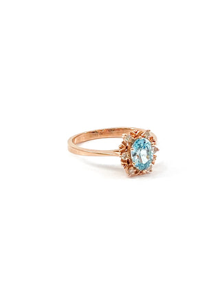 Anillo de oro rosa de 10 quilates con circonita azul de talla ovalada auténtica de 1,20 quilates y halo de diamantes de 0,09 quilates, talla 7