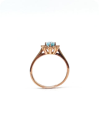 Anillo de oro rosa de 10 quilates con circonita azul de talla ovalada auténtica de 1,20 quilates y halo de diamantes de 0,09 quilates, talla 7