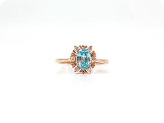 Anillo de oro rosa de 10 quilates con circonita azul de talla ovalada auténtica de 1,20 quilates y halo de diamantes de 0,09 quilates, talla 7