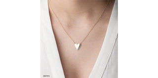 Colgante en forma de corazón con diamantes de 0,14 quilates en oro amarillo de 10 quilates, 18"