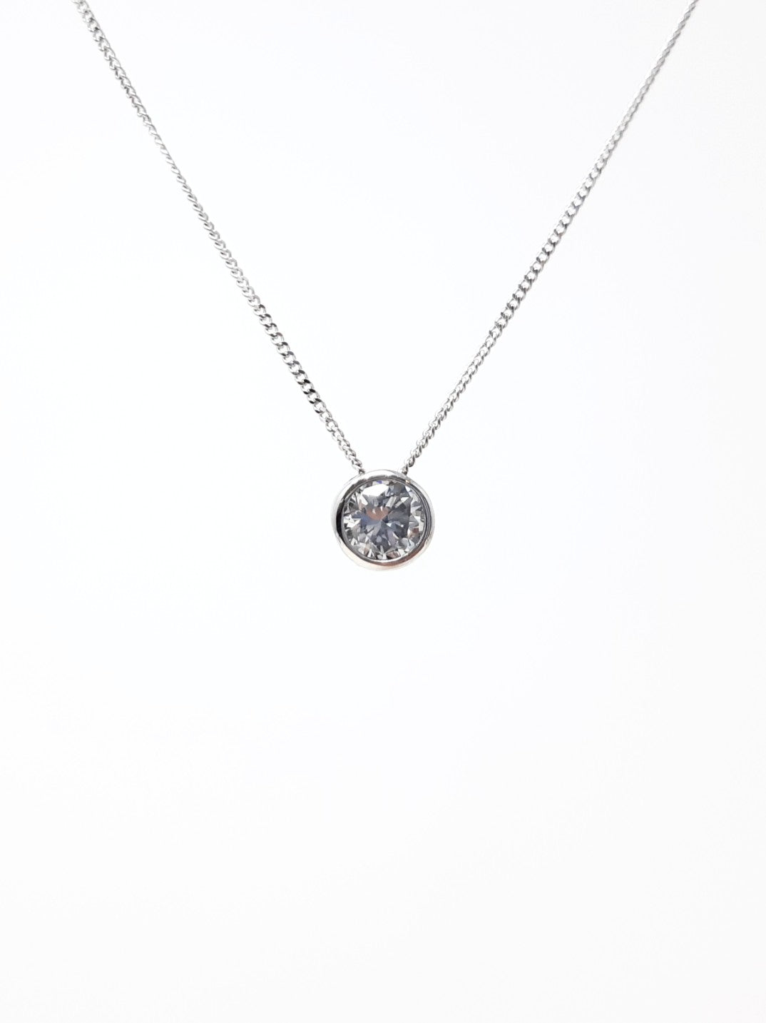 10K White Gold 0.28cttw Bezel Set Diamond Pendant, 18"