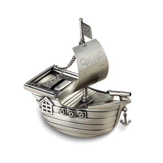 Silver model of a pirate ship on a white background