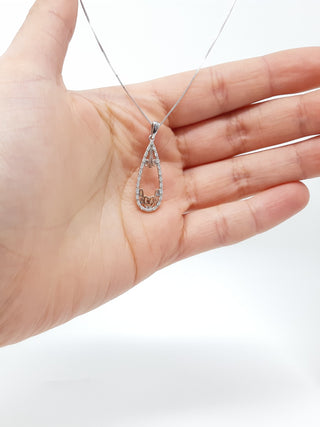 Colgante de diamantes de dos tonos