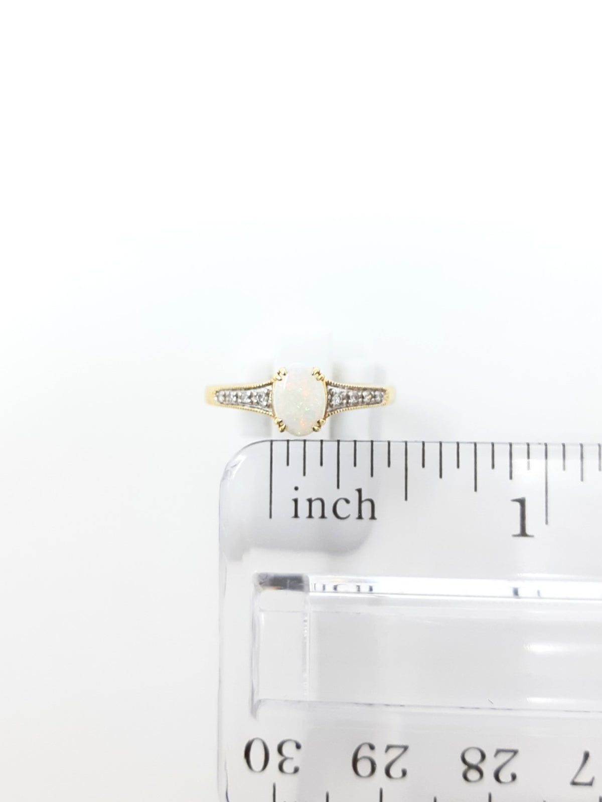 10K Yellow Gold 0.50cttw Genuine Opal and 0.04cttw Diamond Ring, size 7