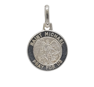 Silver Saint Michael pendant on a white background