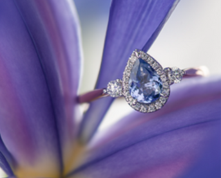 14K Rose Gold Genuine Pear Shape Tanzanite and 0.21cttw Canadian Diamond Ring, size 6.5
