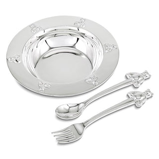 Silver plate with floral designs and matching spoon and fork on a white background