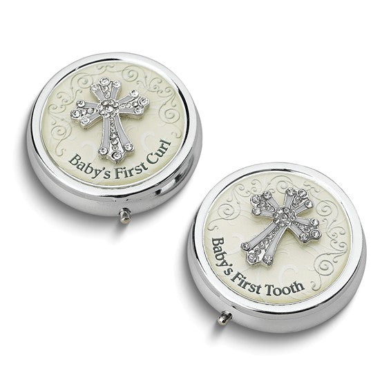 Two silver containers with cross designs, labeled 'Baby's First Curl' and 'Baby's First Tooth', on a white background.