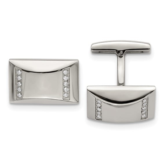 Pair of silver cufflinks with embedded diamonds on a white background