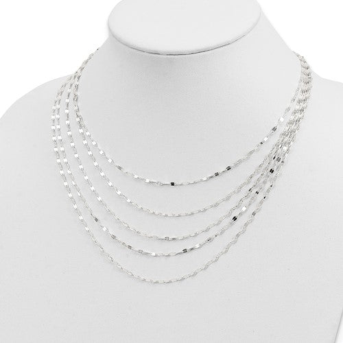 Silver chain necklace on a mannequin with a white background