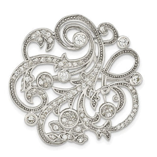 Decorative silver brooch with intricate designs and small crystals on a white background