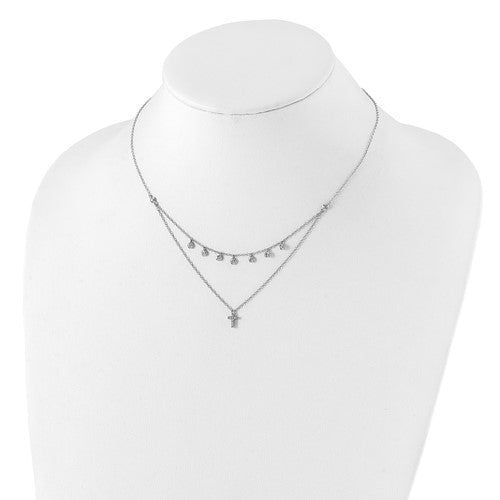 Two necklaces on a mannequin bust against a white background