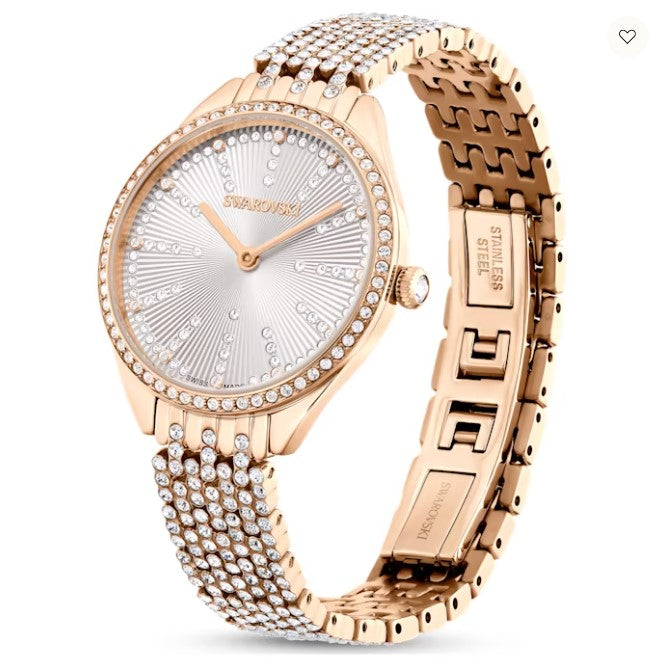 Rose gold Swarovski watch with diamond-studded bracelet on a white background