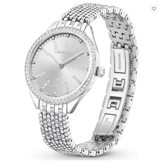 Silver Swarovski watch with intricate design on a white background